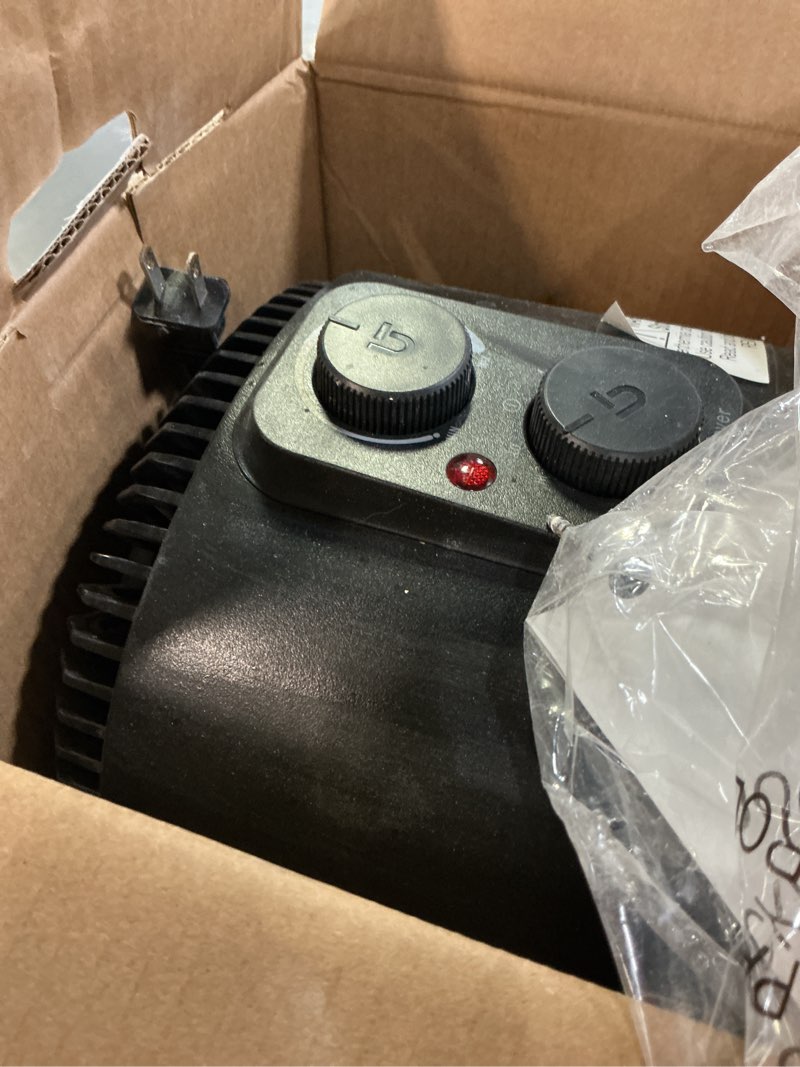 Condition photo showing As Is for  Utilitech 1500 -Watt Fan Compact personal Indoor Electric Space Heater with Thermostat