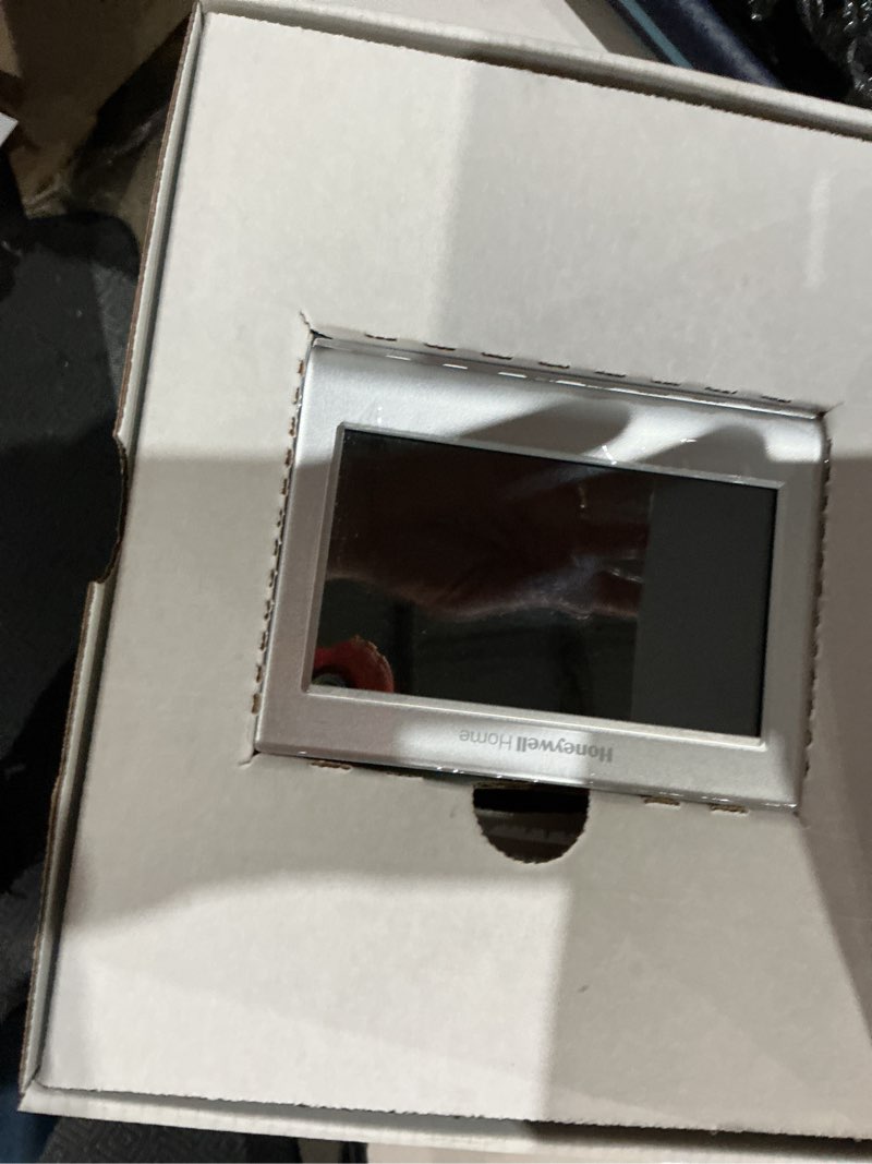 Condition photo showing As Is for honeywell home smart color built in wifi heating and cooling touch screen programmable thermostat