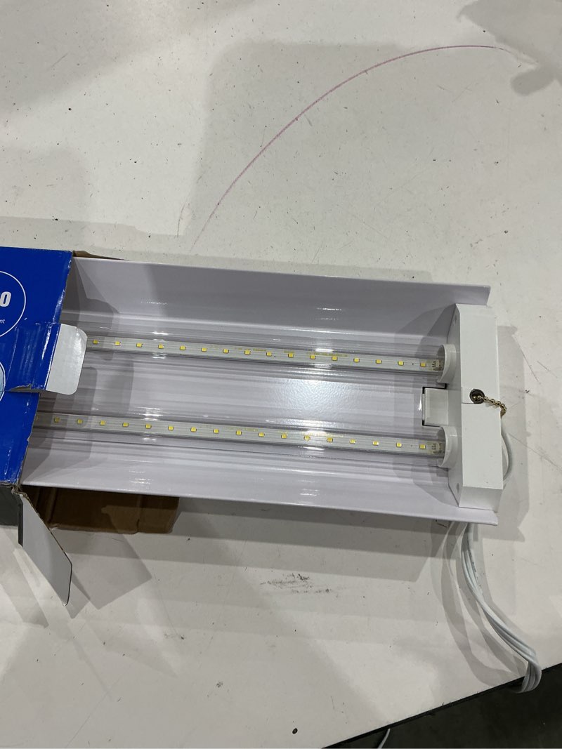 Condition photo showing As Is for westinghouse 4ft. led linkable indoor shop light, 5000 lumens, white