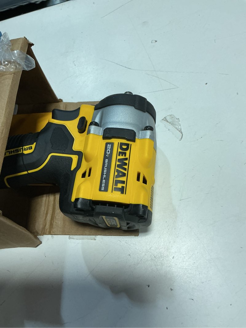 Condition photo showing As Is for dewalt 20v max atomic 3/8 in. cordless brushless compact impact wrench tool only