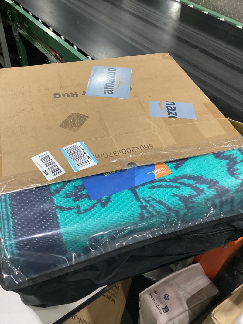 Condition photo showing Good Condition for garvee outdoor rug for patio clearance, 10 ft x14 ft waterproof large camping mat, reversible plastic straw rugs for rv, camper, balcony, backyard, picnic, deck (light blue/white) light blue/white 10' x 14' (rectangular)