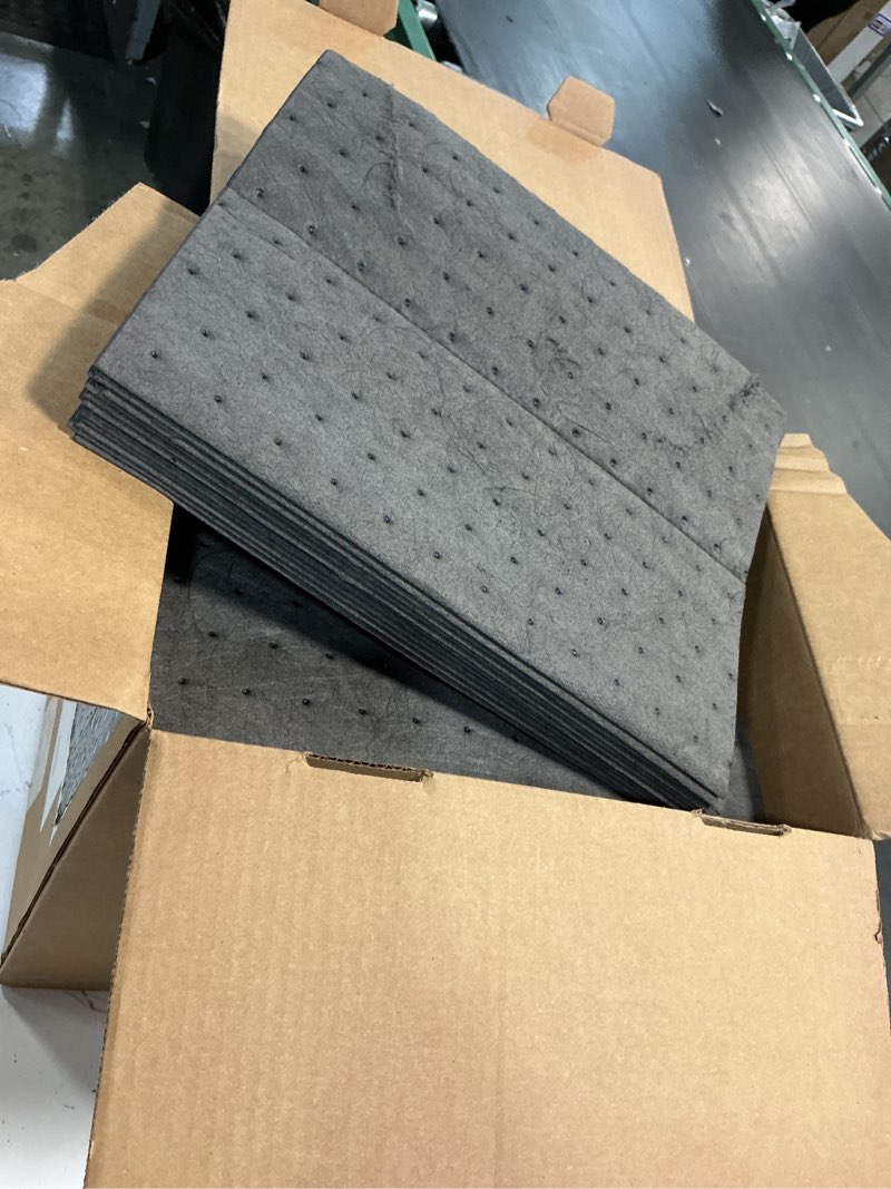 Condition photo showing New/Like New for pig absorbent mat pads in a dispenser box | absorbs up to 12.8 oz per pad | 10" w x 13" l | heavyweight | 100 pads | mat251