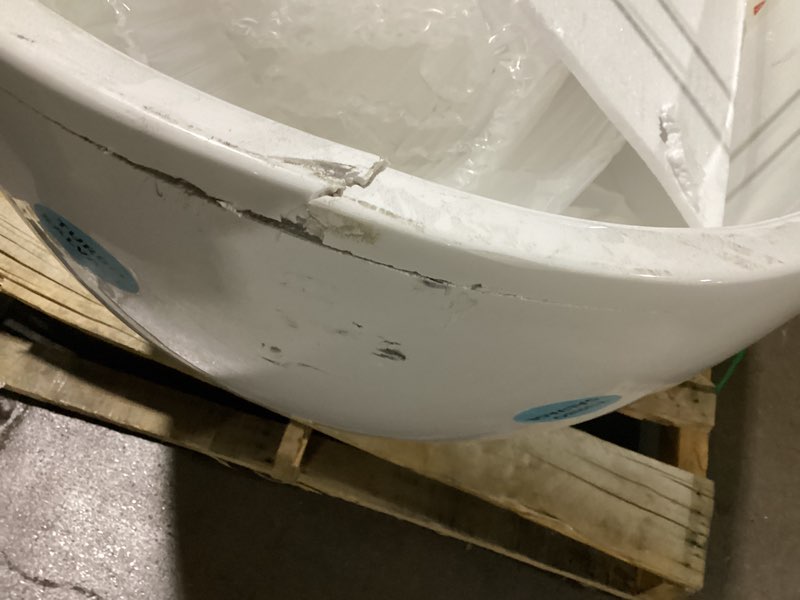 Condition photo showing As Is for streamline acrylic flatbottom freestanding bathtub cracked caddy not included