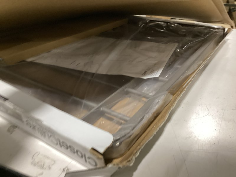 Condition photo showing New/Like New for closet culture by knape & vogt 1.19 in. h x 23.44 in. w x 17.00 in. d champagne nickel pants rack kit for closet system