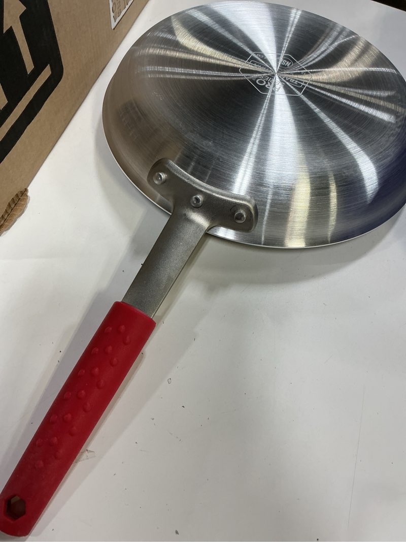 Condition photo showing As Is for Tramontina Professional 12-Inch Non Stick Large Frying Pan, Heavy-Gauge Aluminum Skillet with Reinforced Nonstick Coating, Red Handle, Dishwasher and Oven Safe Nonstick (Red handle) 12 Inch