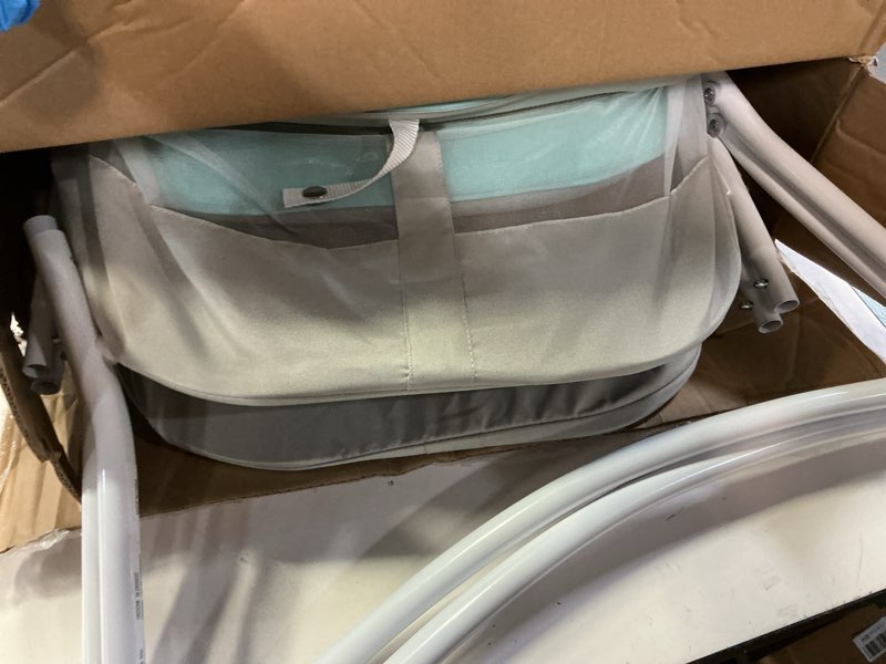 Condition photo showing Good Condition for dream on me karley bassinet, award winner lightweight travel baby bassinet, foldable bedside sleeper, adjustable double canopy, spacious design, soft fabric, storage basket – blue and grey