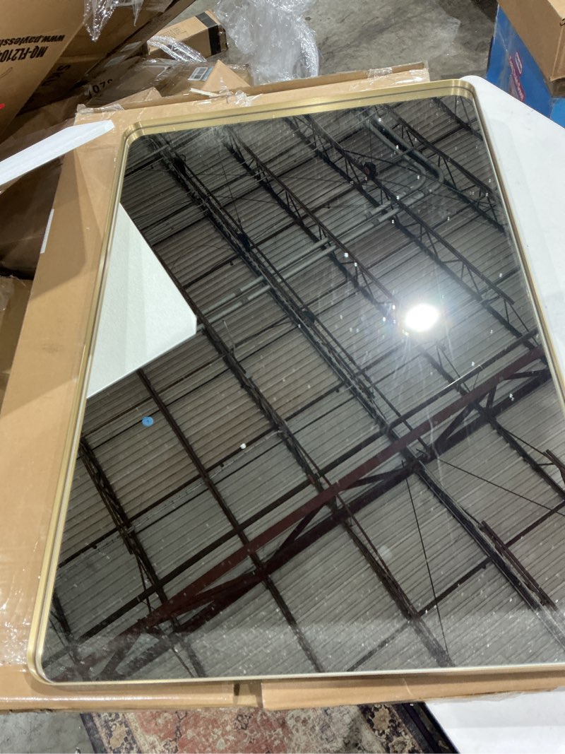 Condition photo showing Good Condition for weer gold bathroom mirror, 24x36 inch brushed gold metal frame mirror, rounded rectangle gold bathroom vanity mirror for wall, tempered glass, anti-rust, hangs horizontally or vertically gold 24"l x 36"w