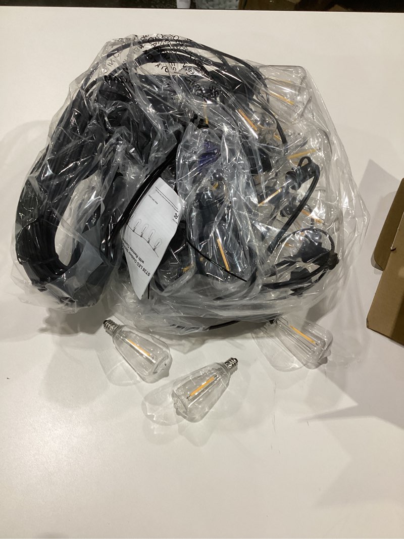 Condition photo showing Good Condition for LED Outdoor String Lights, 120 FT Waterproof Patio Lights with 62 Shatterproof S11 Plastic Bulbs, 2700K Warm White Edison Hanging Lights for Backyard, Garden, Porch, Bistro 200FT Warm White
