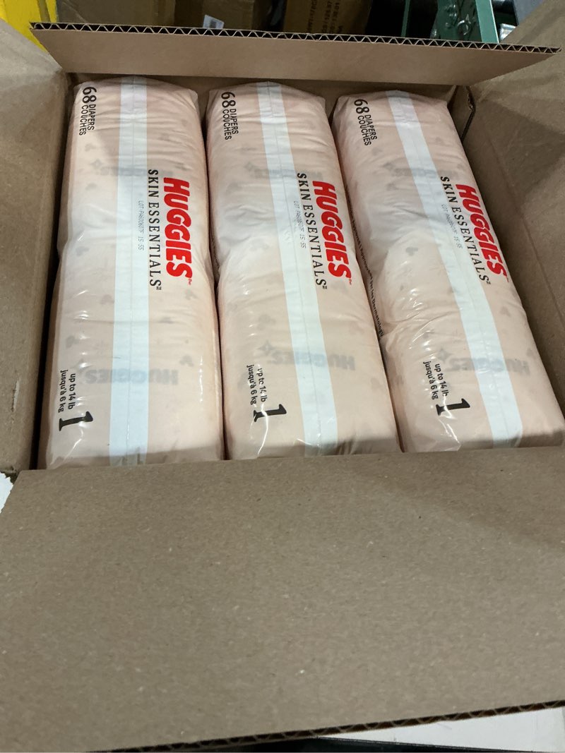 Condition photo showing New/Like New for ((size 1 (8-14 lbs) ))huggies  diapers, skin essentials baby diapers,, 204 count (3 packs of 68), packaging may vary