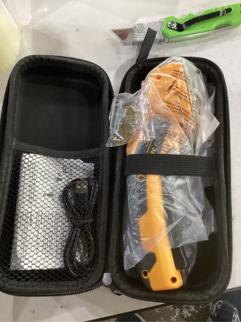 Condition photo showing New/Like New for (not tested)2026 new 3000mah cardboard box cutter with 2 titanium blades, cordless electric scissors with safety lock & led light, storage box, 300rpm, 4v, cutter for fabric carpet carton plastic leather cloth yellow-orange 2