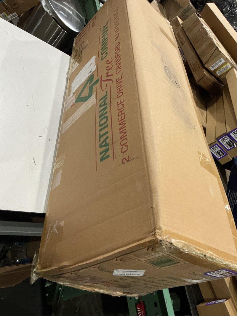 Condition photo showing New/Like New for national tree company pre-lit artificial christmas tree  green  dunhill fir  clear lights  includes stand  6.5 feet