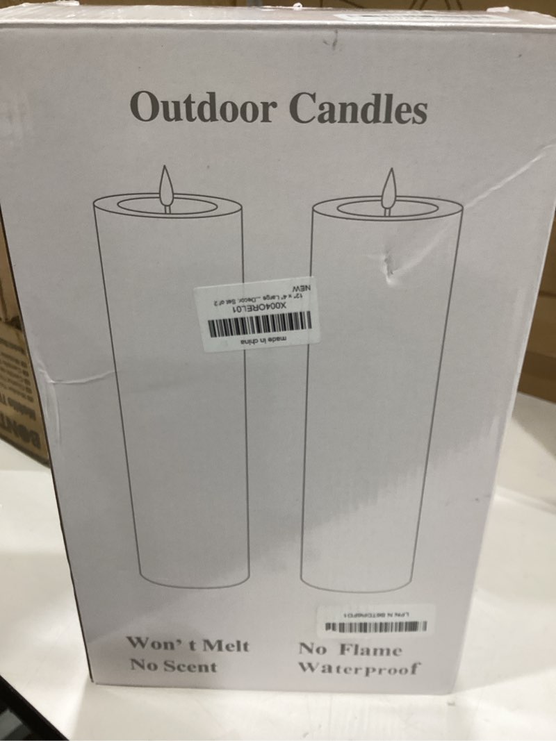 Condition photo showing New/Like New for 4" x 12" large flameless candles with remote & timer, waterproof outdoor battery operated candles le