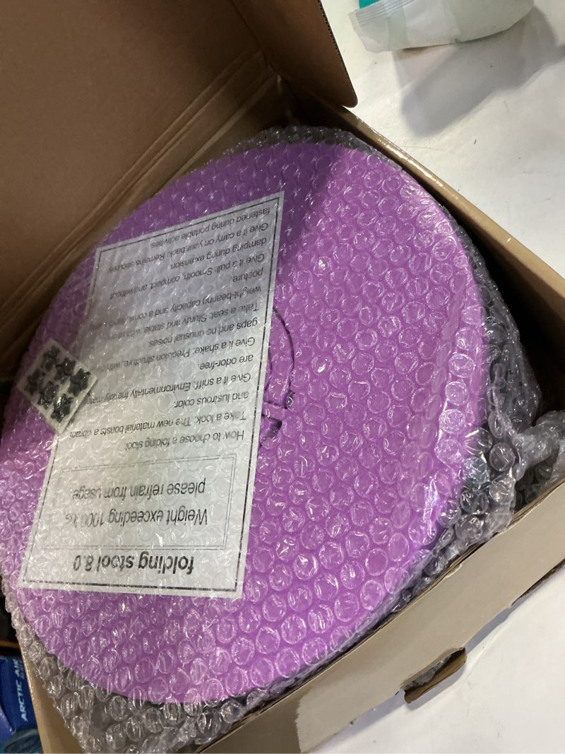 Condition photo showing Good Condition for alevmoom upgraded xxl collapsible stool with cushion 19.7",1000lbs max weight,wider & taller pop up seat, heavy duty portable retractable folding chair or travel foot rest for camping & outdoors purple 11.8“x11.8”x19.7“