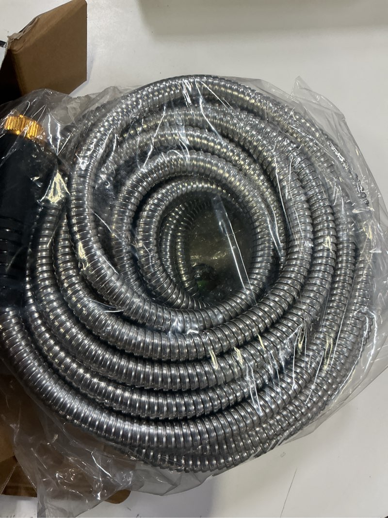 Condition photo showing New/Like New for unywarse garden hose 50ft metal water hose with 10 function nozzle no-kink | flexible, leak-proof, heavy duty, lightweight, pet proof, puncture proof stainless steel hose for yard, outdoor