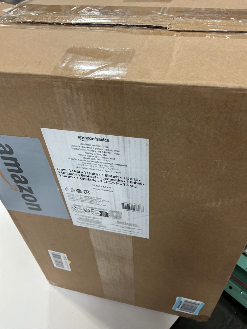 Condition photo showing Good Condition for Amazon Basics 21" Hardside Carry-On Luggage, Hardshell Suitcase With Wheels, Expandable For Up to 25% More Space, With Scratch-Resistant Surface, Four Multi-directional Wheels, Light Blue Light Blue Carry-On