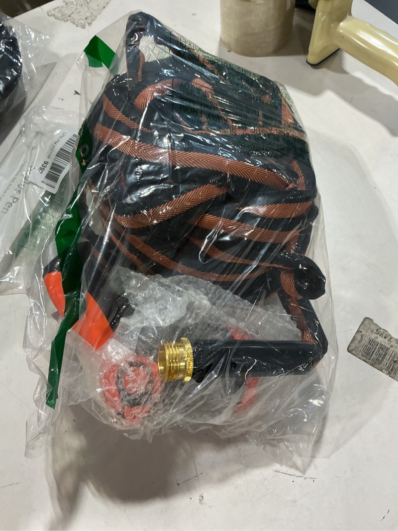 Condition photo showing New/Like New for garden hose 50ft 600 psi high pressure, flexible tpe water hose kink-free & lightweight, with abrasion-resistant cover for car washing, watering lawn, outdoor use 50ft orange