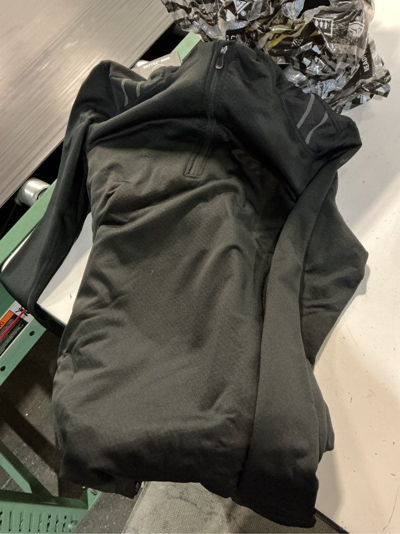 Condition photo showing New/Like New for garneau women's 3000 zip neck