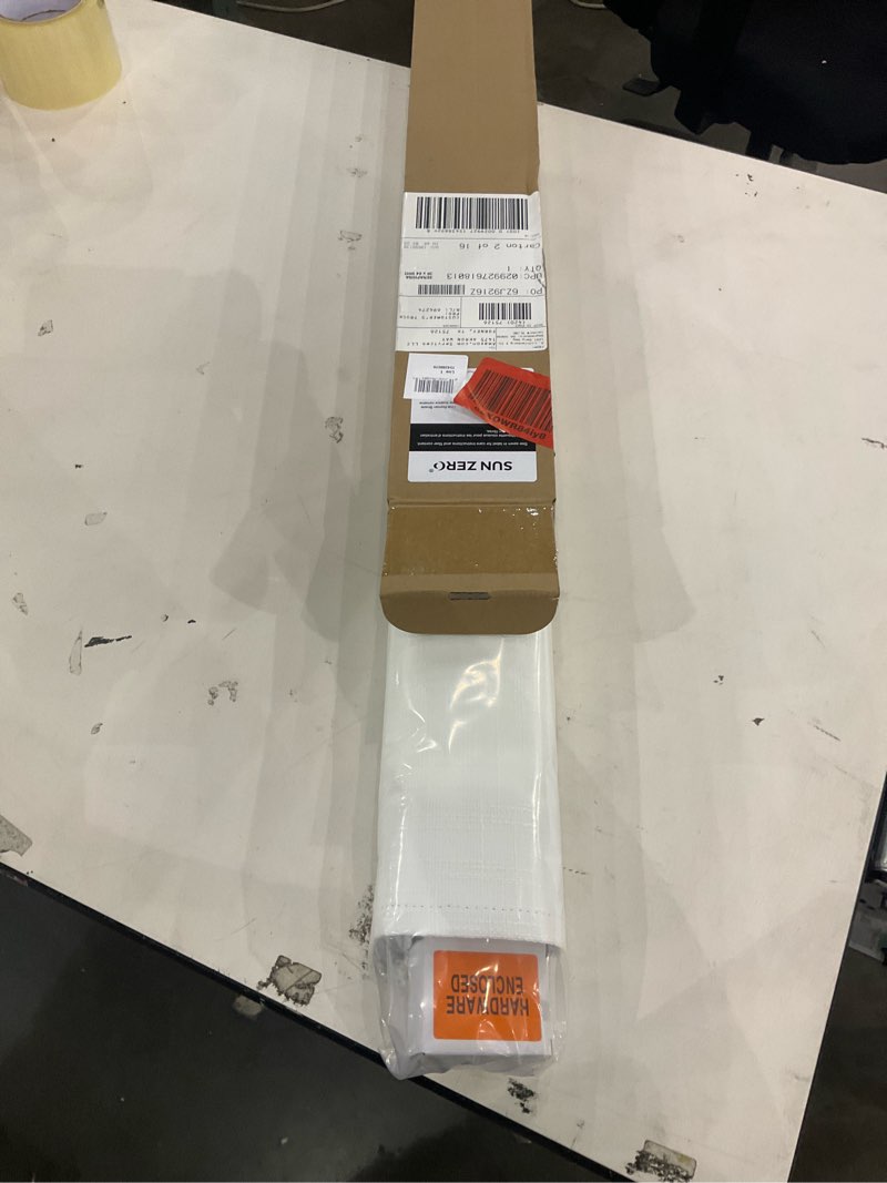 Condition photo showing New/Like New for Sun Zero Seraphina Textured Total Blackout Cordless Roman Shade, 39" x 64", White White 39"W x 64"H