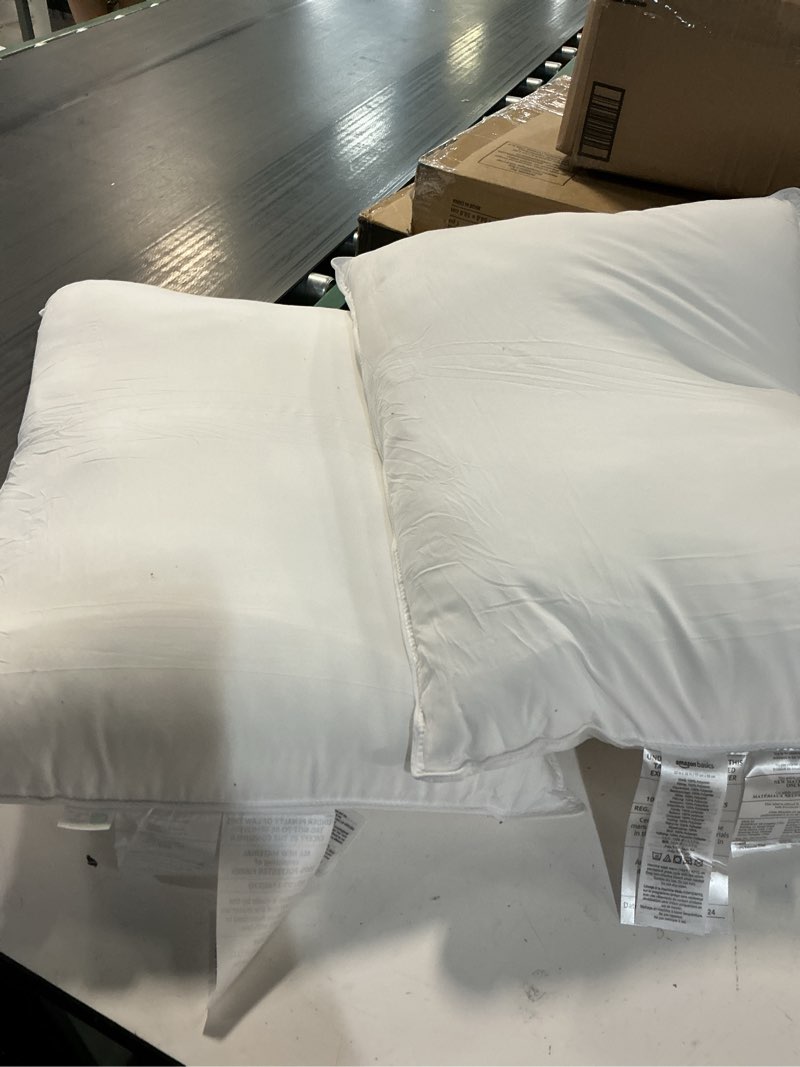 Condition photo showing As Is for amazon basics down alternative pillow for back side sleepers, medium density, standard size, 26" x 20", 2-pack, white standard (pack of 2) medium pillow