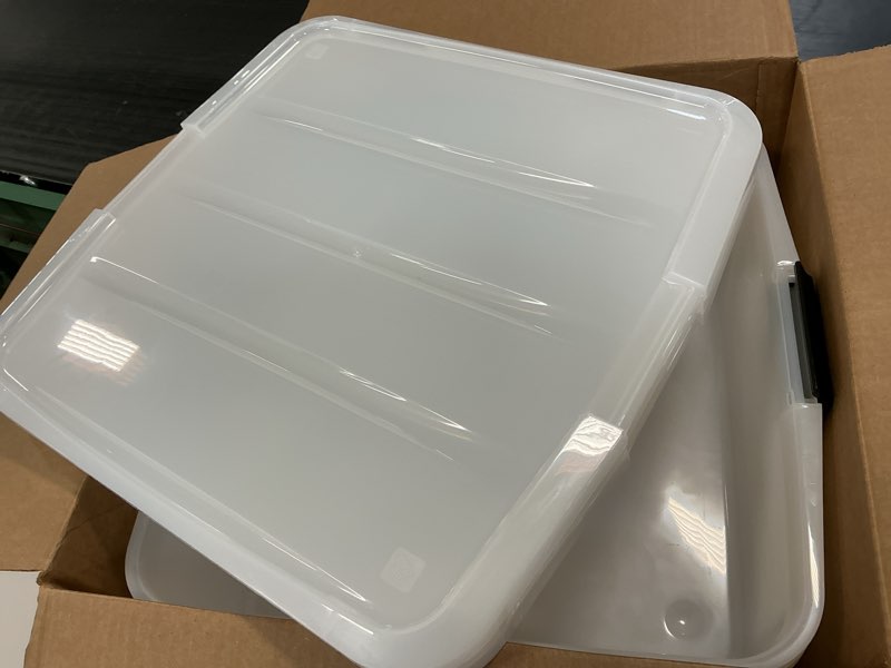 Condition photo showing Good Condition for IRIS USA 33 Qt Plastic Under Bed Storage Organizer Bin Container with Secure Lids and Durable Black Buckles, Multi-Purpose for Clothes, Shoes, Clothing, and Bedding, Short, Clear, 3 Pack 33 Qt. Short - 3 Pack