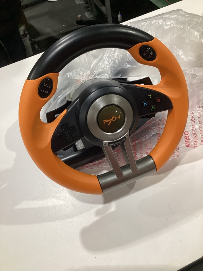 Condition photo showing Good Condition for PXN PC Racing Wheel, V3 PRO 180 Degree Universal USB Car Sim Game Steering Wheel with Pedals for PC, Xbox One, Xbox Series S/X, PS3, PS4, Switch Orange