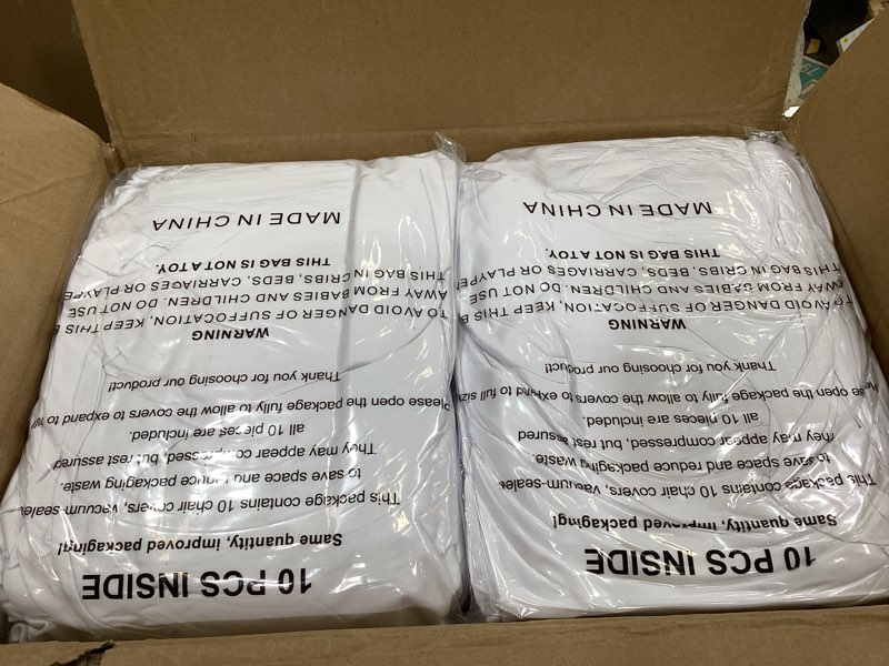 Condition photo showing New/Like New for 100 pieces white chair covers - versatile stretch polyester spandex dining chair slipcovers for dining, party, wedding, banquet, and more white 100pcs