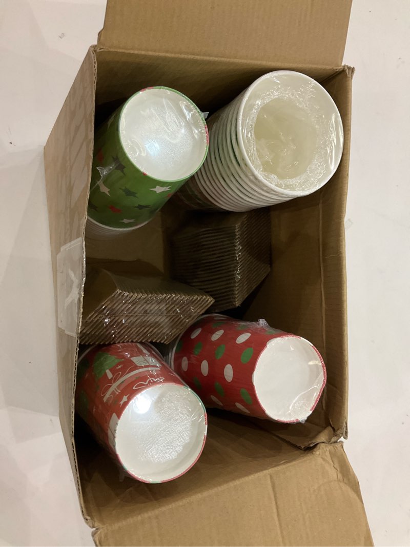 Condition photo showing New/Like New for JOYIN 48 Pcs Merry Christmas Disposable Cups with Sleeves and Lids, 8 Designs Xmas Drinkware 16 oz Paper Cup For Hot Chocolate Coffee Cold Beverage Holiday Tableware Winter Party Supplies Favors Classical