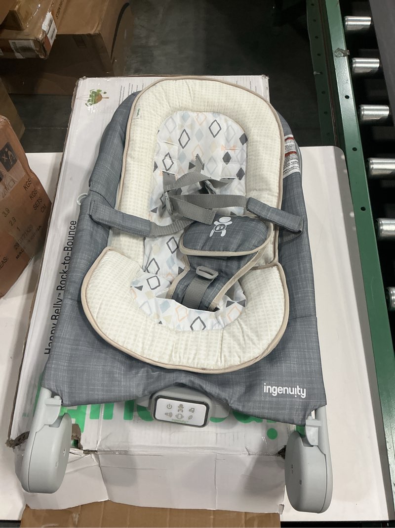 Condition photo showing Good Condition for Ingenuity Gas Relief and Anti-Colic Baby Bouncer Seat and Rocker, Gentle Belly Message to Relax and Soothe Bellies, Instant Tummy Soother, 20 Songs and Melodies – Parker Gray-Parker