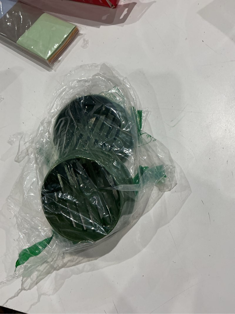 Condition photo showing Good Condition for (2 pack) calvana 4” plastic round drainage grate cover, fits 4” pipes, prevents debris, ideal for lawns, patios, and walkways, durable uv-resistant plastic, easy installation, green