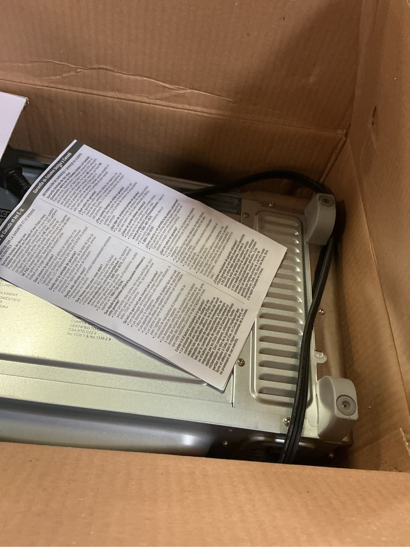 Condition photo showing As Is for BLACK+DECKER 4-Slice Toaster Oven, TO1745SSG-1A, Even Toast, 4 Cooking Functions Bake, Broil, Toast and Keep Warm, Removable Crumb Tray, Timer