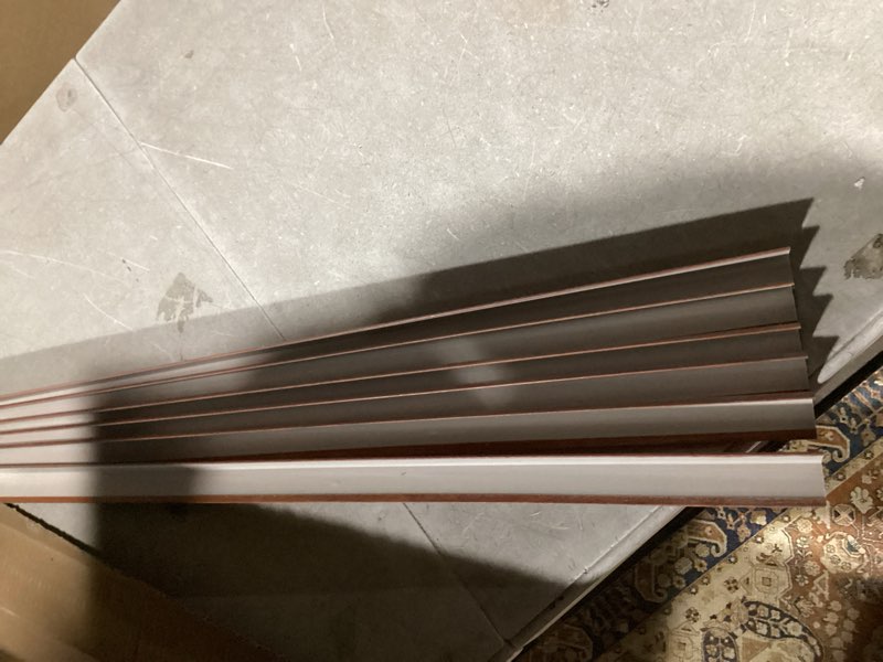 Condition photo showing Good Condition for 6 Pcs 49" Wall Corner Protector Trim, Walnut Wood Grain Edge Strip for Door and Window Frames Mirror Trim Backsplash Tile Edge (Walnut) 6pcs * Walnut