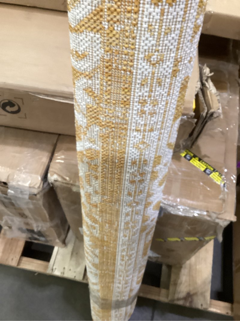 Condition photo showing As Is for jonathan y smb101i-5 sinjuri medallion textured weave indoor outdoor area-rug, coastal, traditional, transitional easy-cleaning,bedroom,kitchen,backyard,patio,non shedding, yellow/cream, 5 x 8 yellow/cream 5 x 8