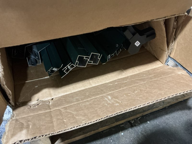 Condition photo showing As Is for (Incomplete) 6x10 FT Greenhouse for Outdoors, Polycarbonate Flower Greenhouse with Roof Vent, Push-Pull Lockable Door, Aluminum Walk-in Greenhouses for Outside Garden Backyard, Patio, Lawn, Silver Silver 6x10 FT