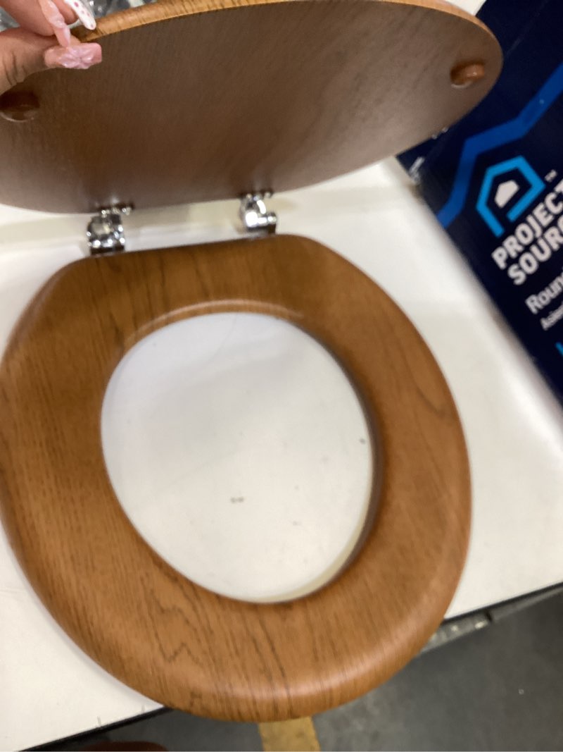 Condition photo showing As Is for project source wood oak veneer round toilet seat