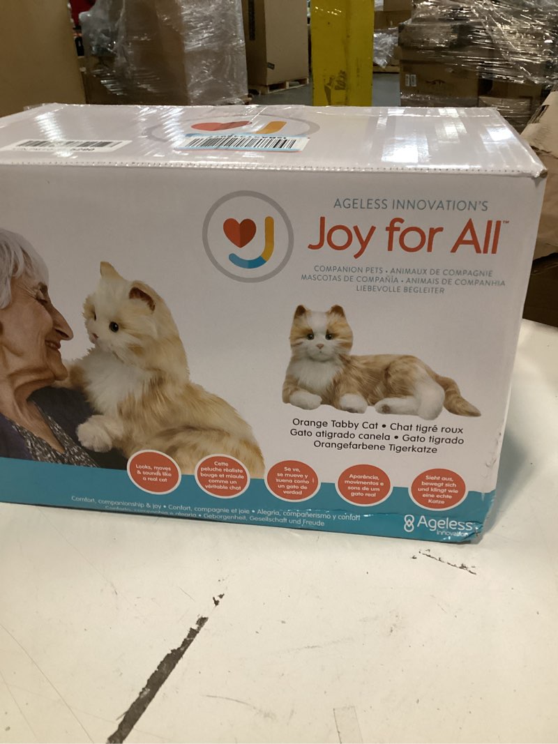Condition photo showing New/Like New for JOY FOR ALL Companion Pet for Seniors - Lifelike Animatronic Cat - Realistic Soft-Touch Fur & Purring - Therapy Stuffed Animal - Toy for Alzheimer's & Dementia - Orange Tabby Orange Tabby Cat