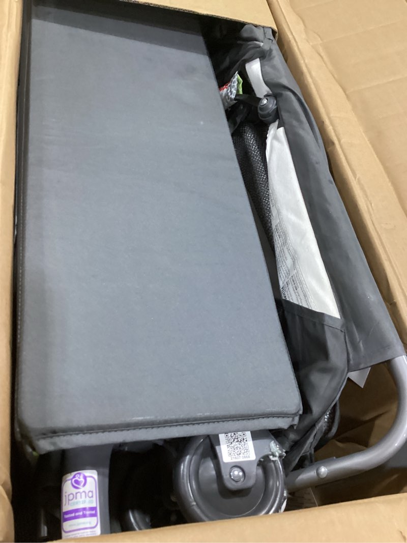 Condition photo showing As Is for baby Trend Lil' Snooze™ Deluxe II Nursery Center® Playard, Funfetti Deluxe nursery center Funfetti