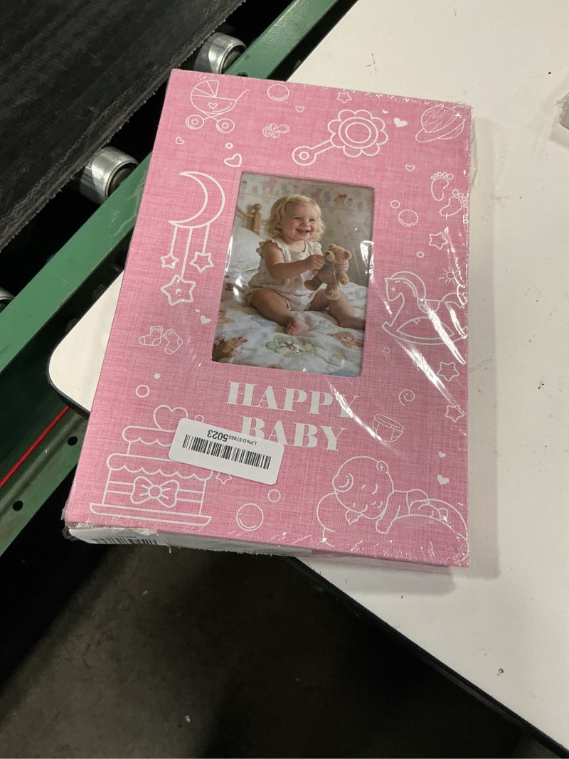Condition photo showing New/Like New for baby photo album 4x6 300 pockets with memo area, photo stickers & hand and footprint kit, linen cover baby memory book with front window, first year keepsake for newborn boy girl