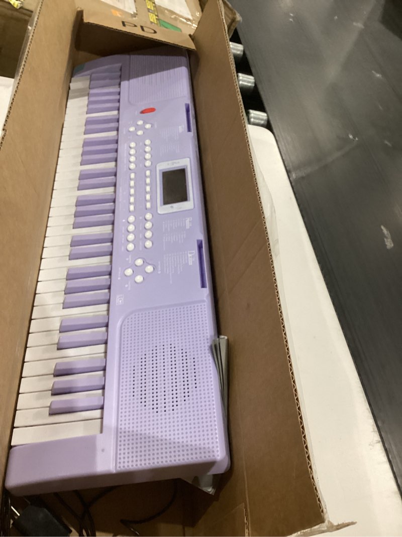 Condition photo showing As Is for Piano Keyboard, 61 Key Upgrade Kids Pianos Music Toy with Light-up Keys & Pro Teaching Modes, Dual Speaker, 70 Demos,100 Tones, 100 Rhythms Perfect Christmas/Birthday Gift for Kids (Purple)