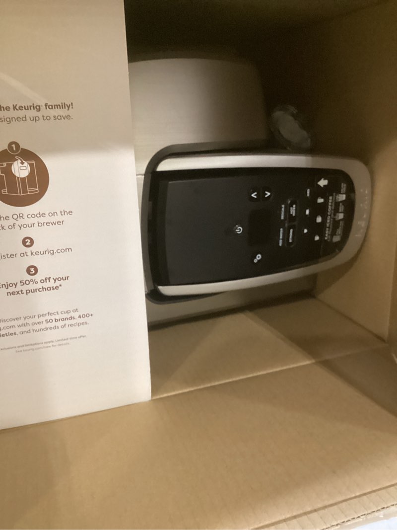 Condition photo showing As Is for keurig k-elite single serve k-cup pod coffee maker, with strength and temperature control, iced coffee capability, 8 to 12oz brew size, programmable, brushed silver