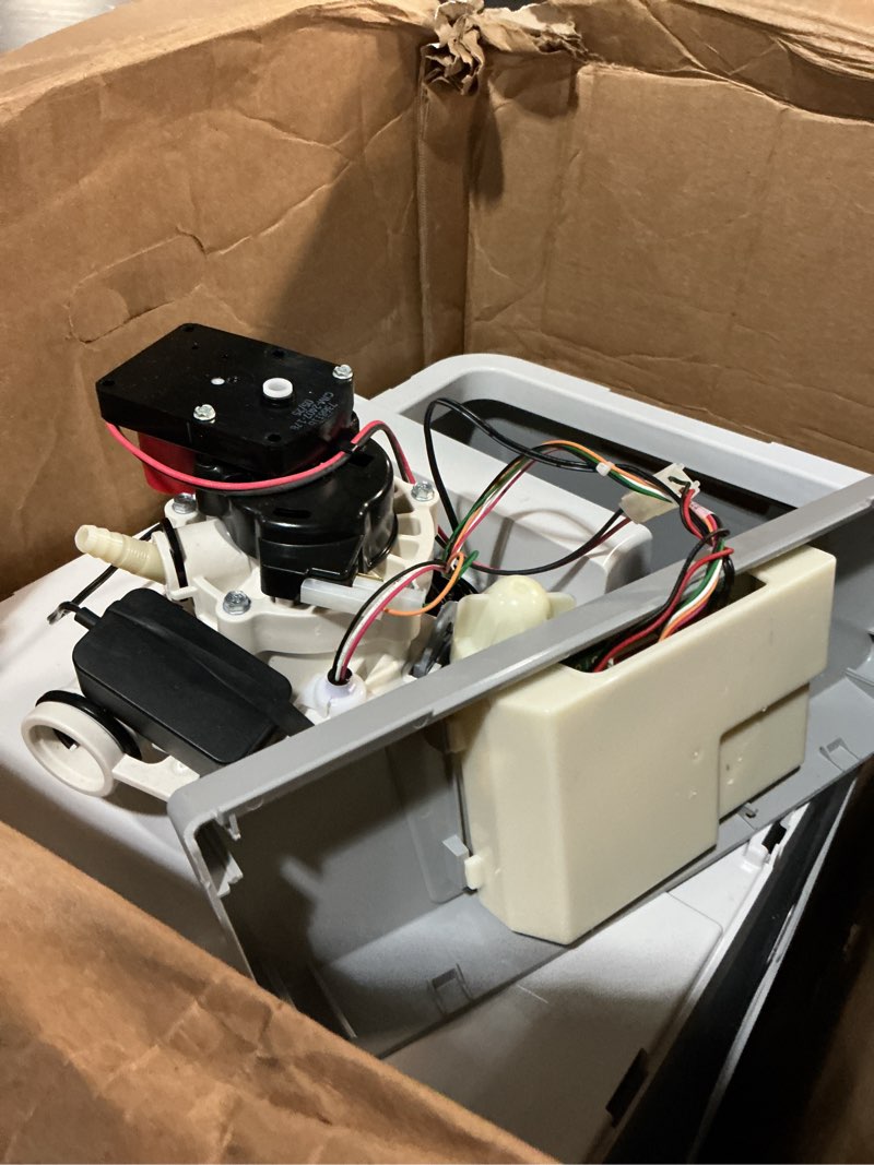 Condition photo showing As Is for whirlpool 33000-grain water softener system