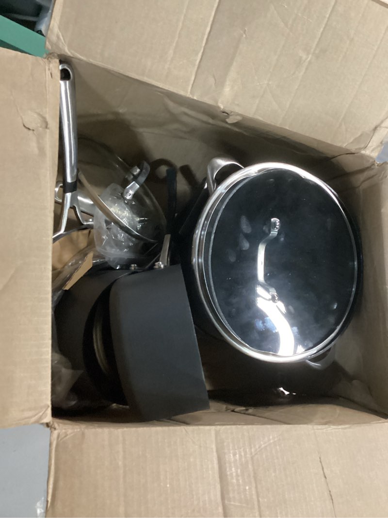 Condition photo showing As Is for calphalon 10-piece non-stick kitchen cookware set black pots & pans with stay-cool stainless steel handles hard-anodized aluminum for even heating 10-piece set