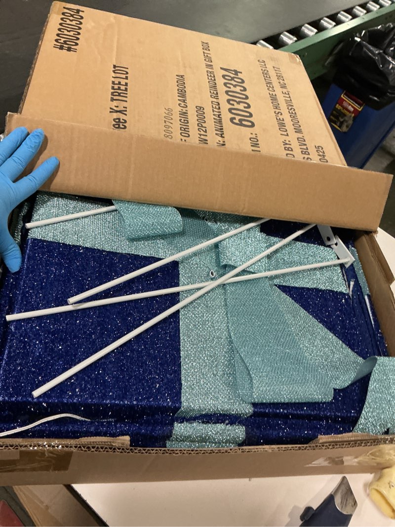 Condition photo showing Good Condition for Holiday Living 4-ft Animatronic LED Reindeer in Giftbox Yard Decoration