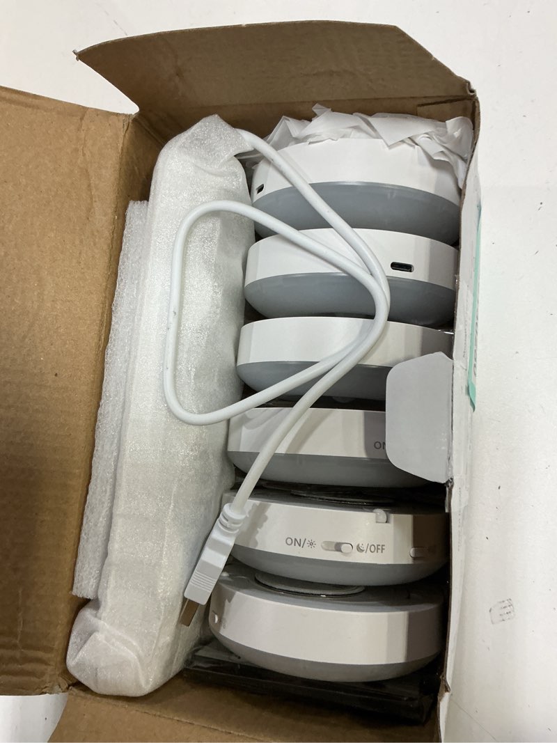 Condition photo showing Good Condition for EZVALO Under Cabinet Lighting with Charging Station,1000mAh Rechargeable Puck Lights with Remote, 3 Color Temps & 12 RGB Closet Lights, Dimmable Motion Sensor Lights for Shelf, Kitchen (6 Packs) White 6packs with Station