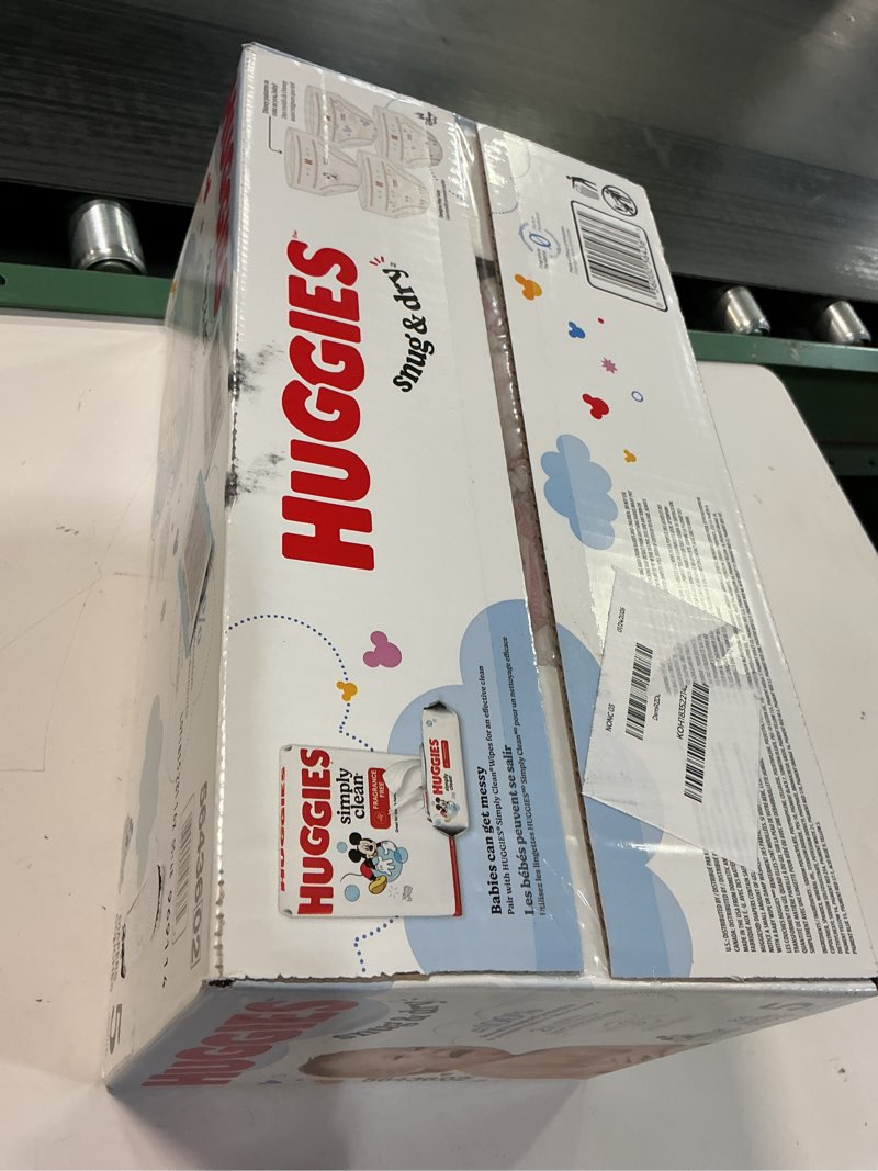 Condition photo showing New/Like New for Huggies Size 5 Diapers, Snug & Dry Baby Diapers, Size 5 (27+ lbs), 84 Count, Packaging May Vary Size 5 84