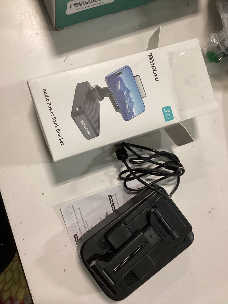 Condition photo showing Good Condition for TechGlow Foldable Cellphone Stand with Bluetooth Speaker Charging Function 360° Rotatable Phone Stand Birthday Gifts for Men Women Mother Father Cool Tech Gadgets Black