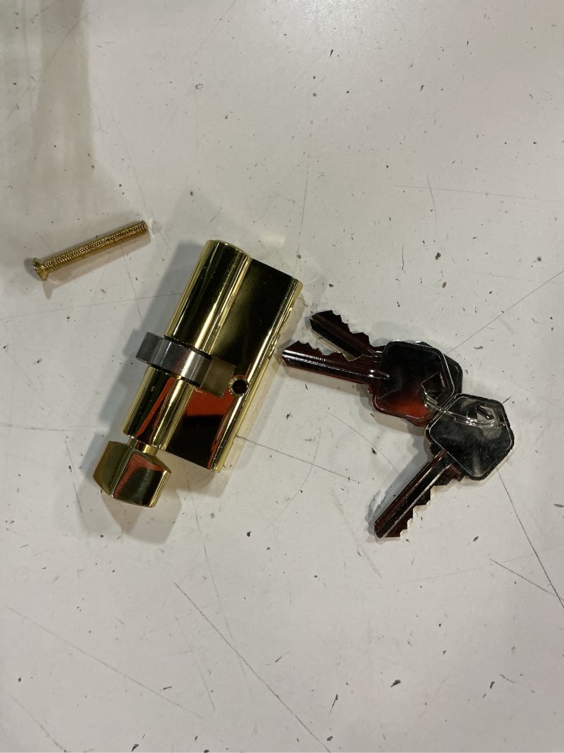 Condition photo showing As Is for offset euro profile lock cylinder with thumb turn fits for pella storm door 2-bolt lock, includes 3 solid brass keys (1, polished brass) polished brass 1