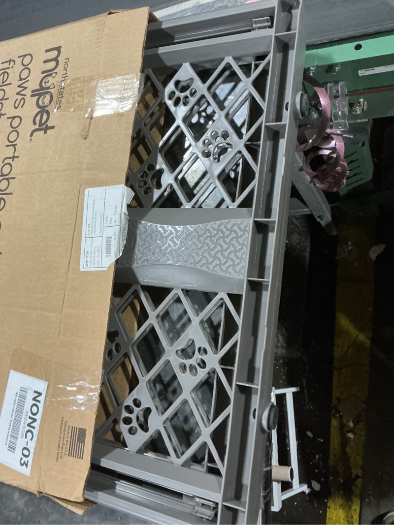 Condition photo showing Good Condition for mypet north states paws portable pet gate: 26-40" wide. pressure mount. no tools needed. made in usa, 23" tall, expandable, durable dog gates for doorways, fieldstone gray
