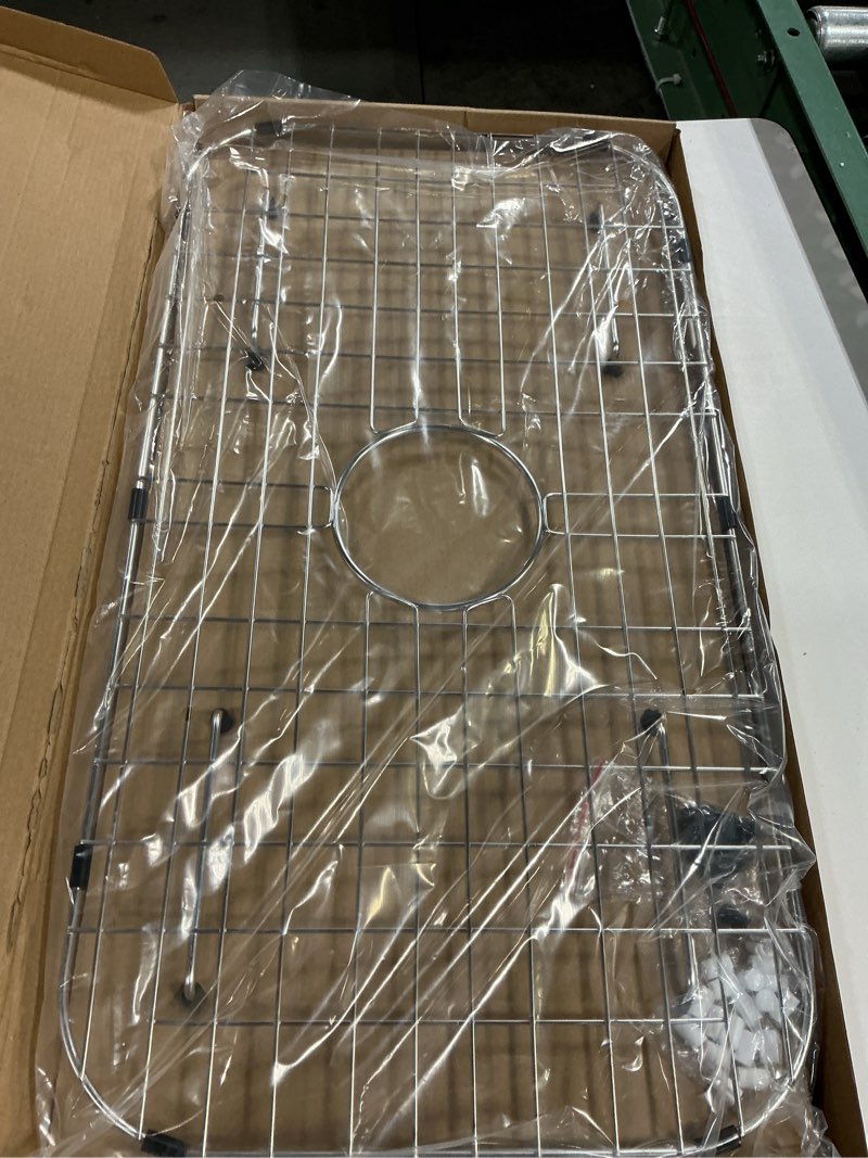 Condition photo showing New/Like New for sink protector grid 26-1/16" x 14-1/16", centered drain with corner radius 3-1/2", 304 stainless steel material sink grid - centered drain 26-1/16" x 14-1/16" centered drain