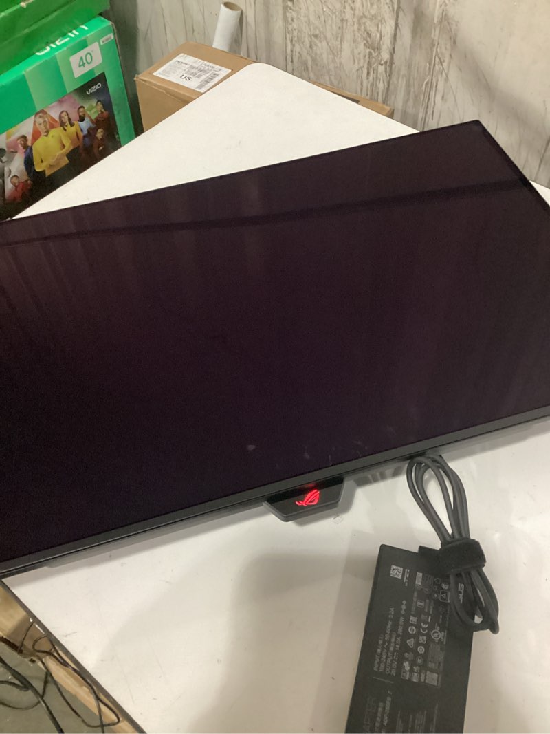 Condition photo showing As Is for ASUS ROG Swift 32” 4K OLED Gaming Monitor (PG32UCDM) - UHD (3840 x 2160), QD-OLED, 240Hz, 0.03ms, G-SYNC Compatible, Custom Heatsink, Graphene Film, 99% DCI-P3, True 10-bit, 90W USB-C 32" OLED 4K 240Hz UHD G-SYNC