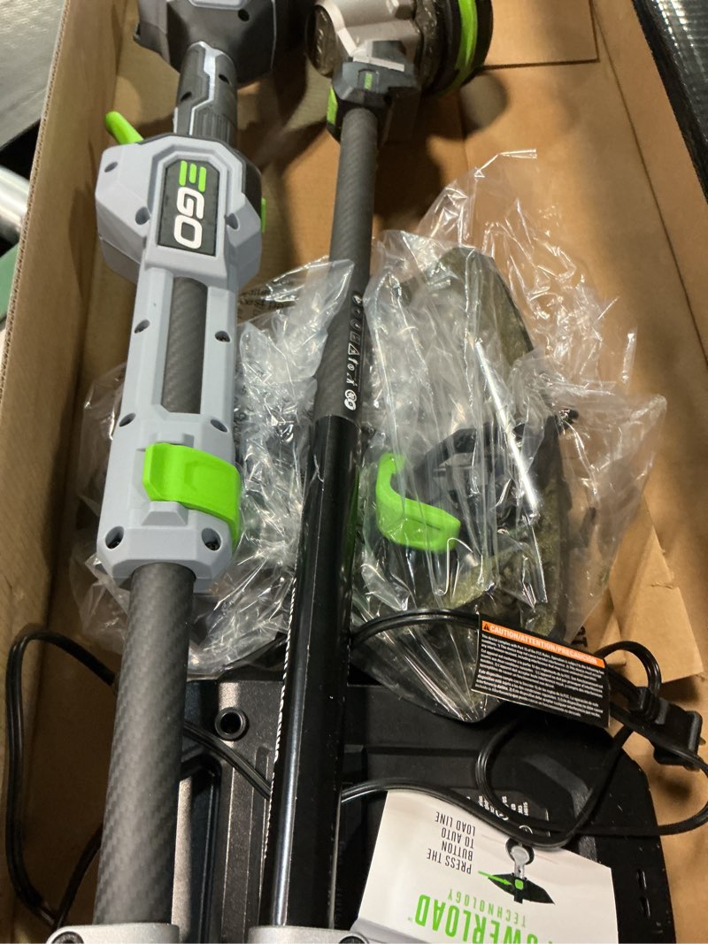 Condition photo showing As Is for ego battery string trimmer kit (battery & charger)